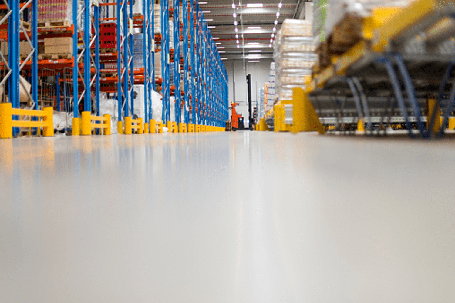 warehouse with epoxy floor, manufacturing and industrial flooring
